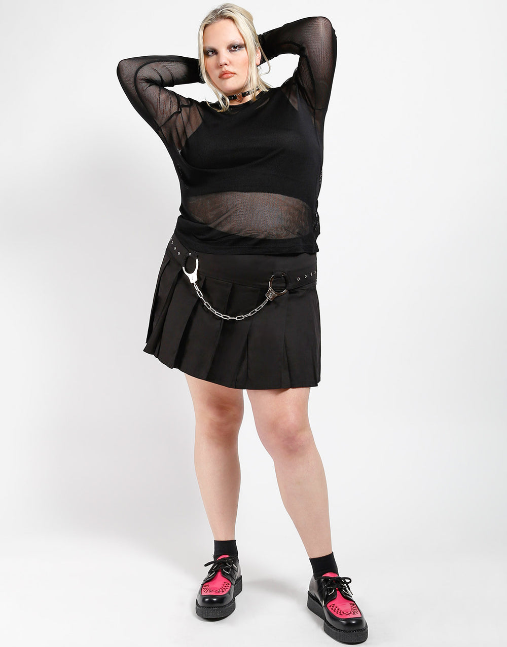 CURVE PLEATED HANDCUFF SKIRT